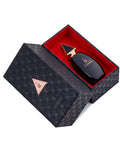 Luxury Florence perfume packaging featuring a black and gold fragrance bottle from the Oscar London Big Ben Collection. The bottle has a sleek, modern design with a pointed gold cap and is elegantly placed inside a black box with a geometric pattern and rose gold accents. The box's interior is lined with rich red velvet for a premium presentation.