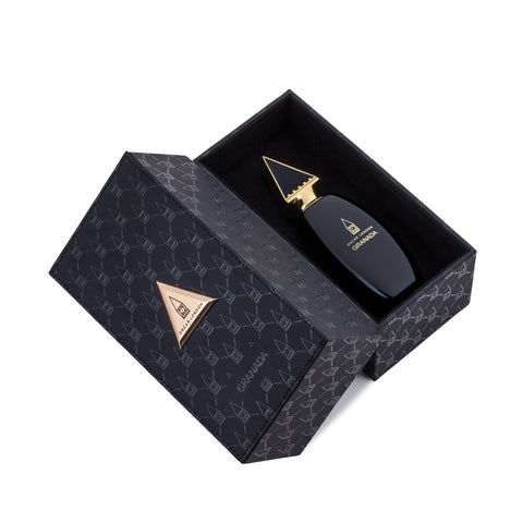 Luxurious Oscar London Granada perfume from the Big Ben Collection, presented in an elegant black leather-textured box with gold accents. The sleek black bottle, featuring a gold triangular cap inspired by Big Ben’s architecture, rests inside the sophisticated case. The rich leather packaging enhances the premium and exclusive appeal of this fragrance.