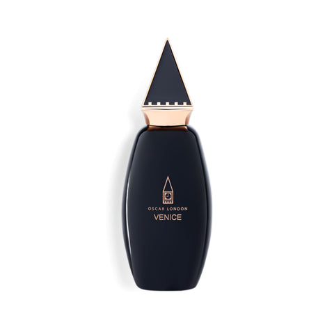 Elegant Oscar London Venice perfume bottle from the Big Ben Collection. The sleek black bottle features a distinctive rose gold triangular cap, inspired by the architectural elements of Big Ben. The minimalist gold-engraved branding adds a touch of luxury, making this fragrance a sophisticated statement piece.